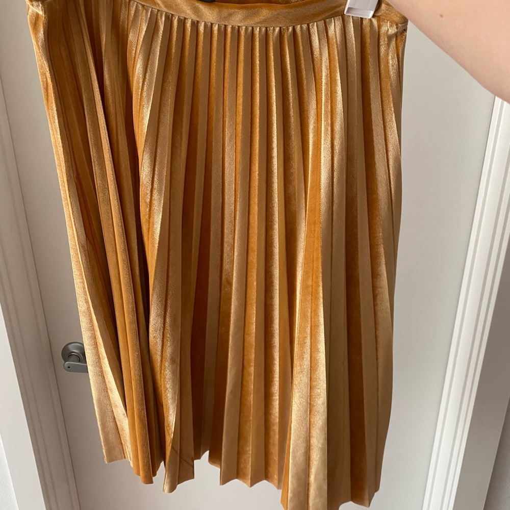 Pleated gold midi skirt